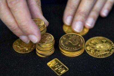 Фьючерсы на золото подешевели во время азиатских торгов - smartmoney.one - США - Reuters