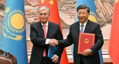 Касым-Жомарт Токаев - Си Цзиньпин - Казахстан и Китай подписали соглашение о взаимном безвизовом режиме - dialog.tj - Китай - Казахстан - Сиань