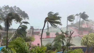 Супертайфун Mawar принес на Гуам сильный ветер и ливни - unn.com.ua - США - Украина - Киев - Гуам