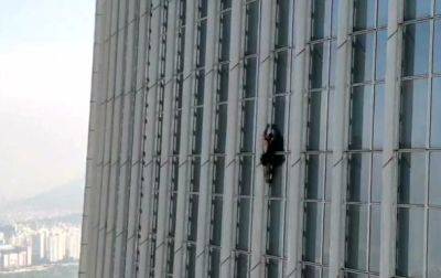 В Сеуле мужчина без снаряжения залез на 72 этаж - korrespondent.net - Южная Корея - Украина - Англия - Сеул
