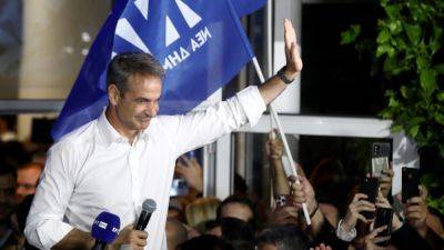 Алексис Ципрас - Кириакос Мицотакис - Правящая партия Греции получила большинство мест в парламенте - svoboda.org - Греция