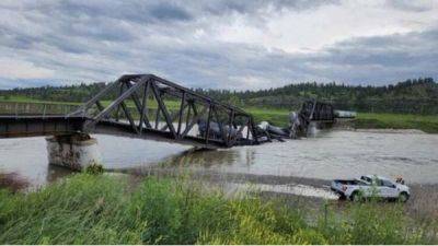 В американском штате Монтана после обрушения моста упали в реку несколько вагонов с ядовитыми веществами - obzor.lt - США - шт. Огайо - USA - штат Монтана - Колумбус