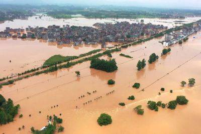 Сильные дожди обрушились на юго-запад Китая, некоторые города затоплены - unn.com.ua - Китай - Украина - Киев - Reuters