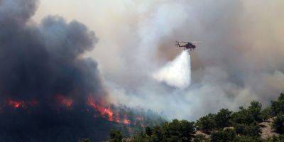 Туроператоры отменяют поездки. В Греции уже семь дней продолжаются лесные пожары, туристы уезжают — фоторепортаж - nv.ua - Украина - Греция