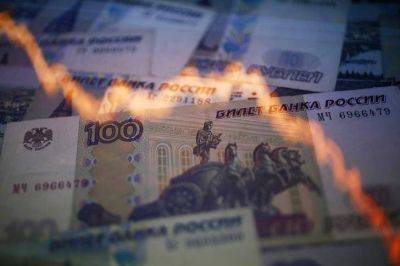 Центробанк понизил курс доллара и евро - smartmoney.one - Россия - Reuters
