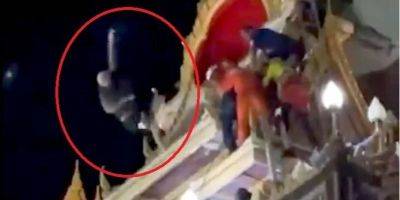 Россиянин залез на крышу храма в Таиланде, подрался со спасателями, а потом спрыгнул вниз и разбился — видео - nv.ua - Россия - Украина - Таиланд - Россияне