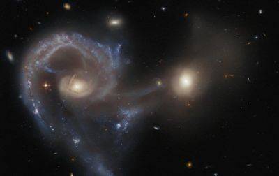 Телескоп Hubble показал галактики, приближающиеся к своему столкновению - korrespondent.net - США - Украина