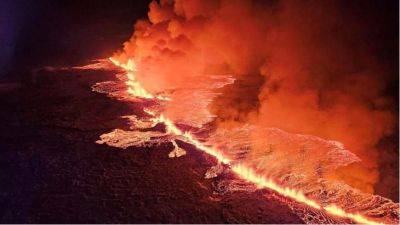 Извержение вулкана возле исландского города привело к эвакуации жителей - obzor.lt - Исландия