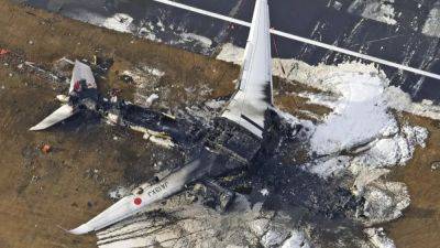 Столкновение самолетов в Токио: "это было настоящее чудо" - ru.euronews.com - Токио - Япония - Токио