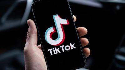 TikTok увольняет сотни сотрудников и внедряет ИИ для модерации контента - gagadget.com - Китай - Малайзия - Reuters