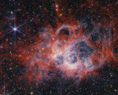 James Webb - James Webb сфотографировал исполинский звездный роддом в соседней галактике - universemagazine.com